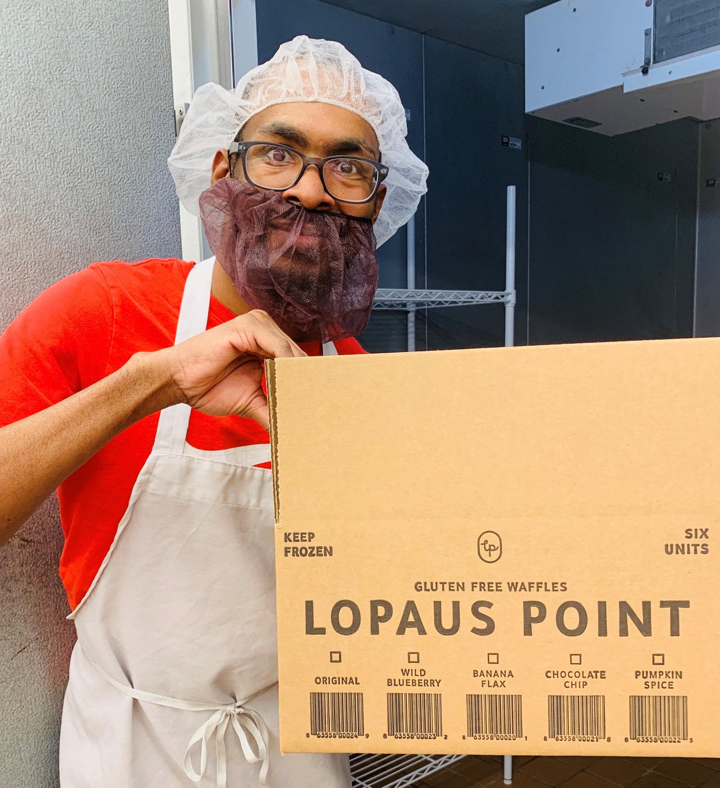 Brandon fills a box with Lopaus Point waffles